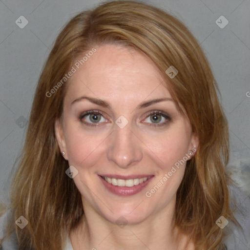 Joyful white young-adult female with medium  brown hair and blue eyes