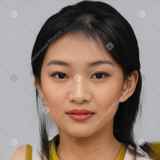 Joyful asian young-adult female with medium  black hair and brown eyes