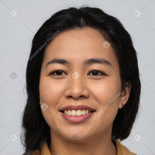 Joyful asian young-adult female with medium  brown hair and brown eyes