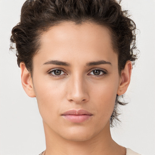 Neutral white young-adult female with short  brown hair and brown eyes