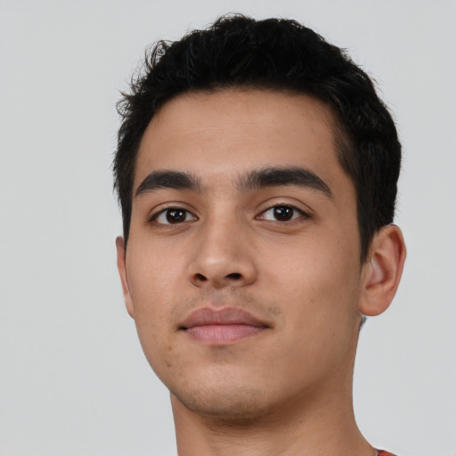 Neutral latino young-adult male with short  black hair and brown eyes