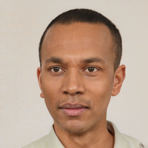 Neutral latino adult male with short  black hair and brown eyes
