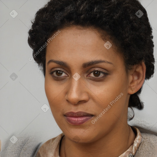 Joyful latino young-adult female with short  brown hair and brown eyes