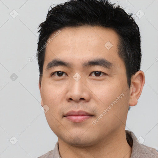 Neutral asian young-adult male with short  black hair and brown eyes