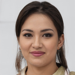 Joyful white young-adult female with medium  brown hair and brown eyes