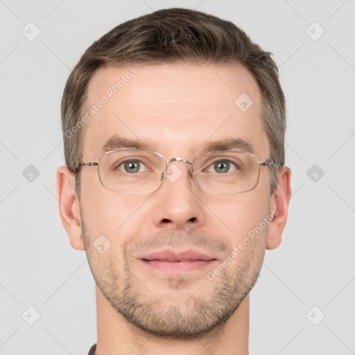 Joyful white adult male with short  brown hair and grey eyes