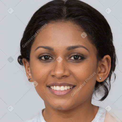 Joyful black young-adult female with medium  brown hair and brown eyes