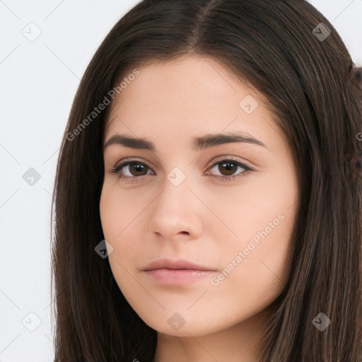 Neutral white young-adult female with long  brown hair and brown eyes