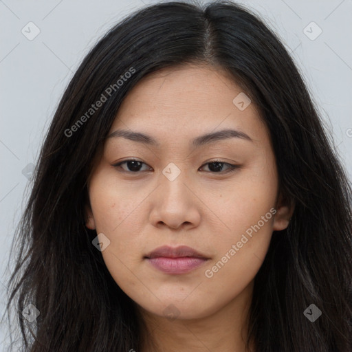 Joyful asian young-adult female with long  brown hair and brown eyes