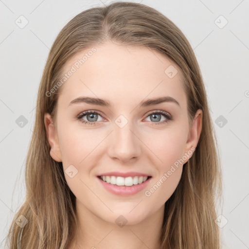 Joyful white young-adult female with long  brown hair and grey eyes