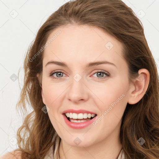 Joyful white young-adult female with long  brown hair and green eyes