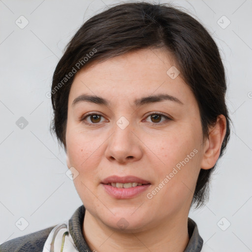 Joyful white young-adult female with medium  brown hair and brown eyes