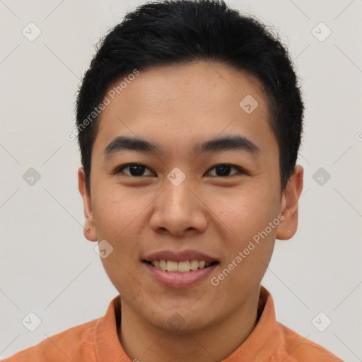 Joyful latino young-adult male with short  black hair and brown eyes