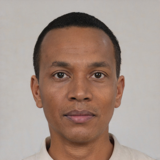 Neutral black young-adult male with short  black hair and brown eyes