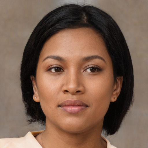 Neutral asian young-adult female with medium  black hair and brown eyes