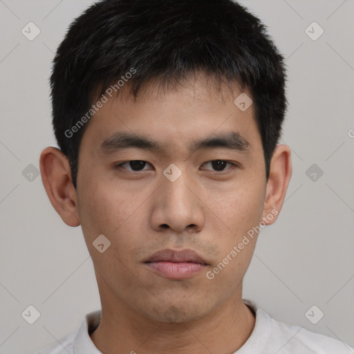 Neutral asian young-adult male with short  brown hair and brown eyes