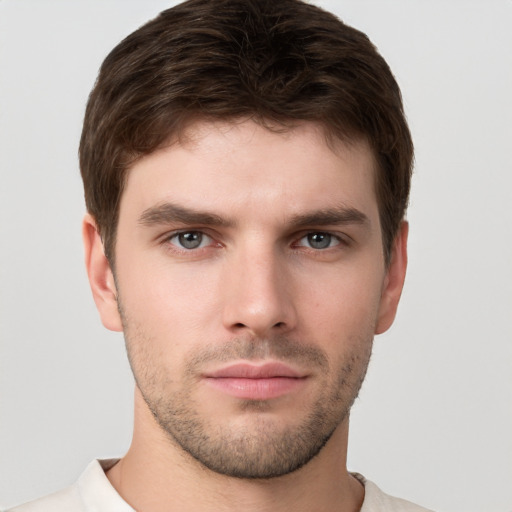 Neutral white young-adult male with short  brown hair and brown eyes