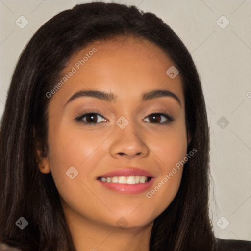 Joyful latino young-adult female with long  brown hair and brown eyes