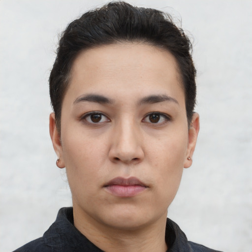 Neutral white young-adult female with short  black hair and brown eyes