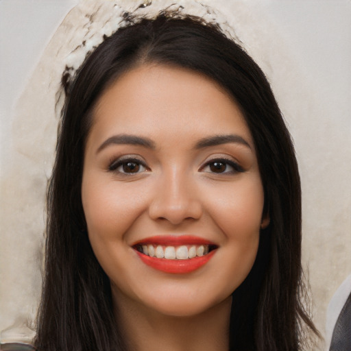 Joyful white young-adult female with long  black hair and brown eyes