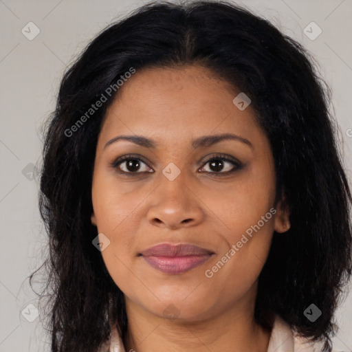 Joyful latino young-adult female with long  brown hair and brown eyes