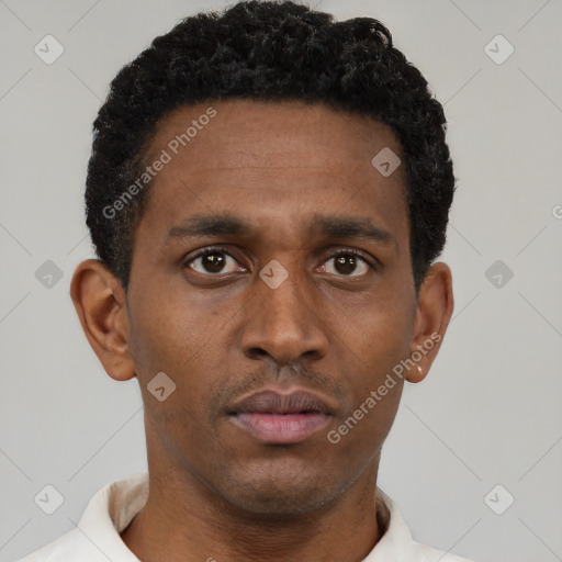 Neutral latino young-adult male with short  brown hair and brown eyes