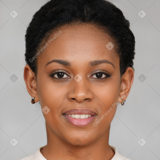 Joyful black young-adult female with short  black hair and brown eyes