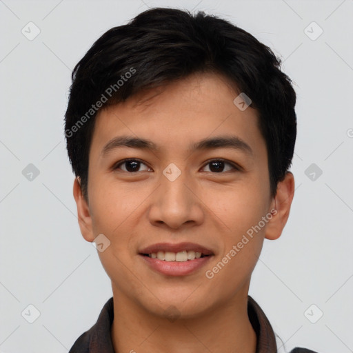 Joyful asian young-adult male with short  black hair and brown eyes