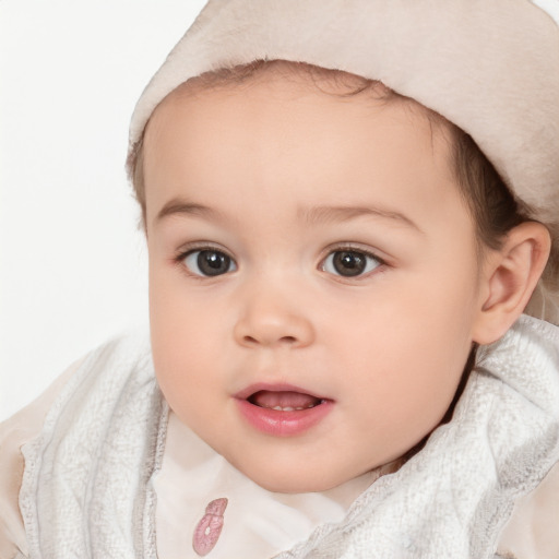 Joyful white child female with short  brown hair and brown eyes