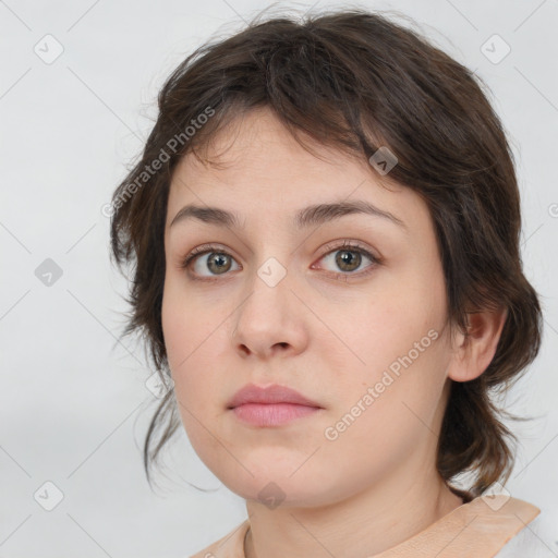 Neutral white young-adult female with medium  brown hair and brown eyes