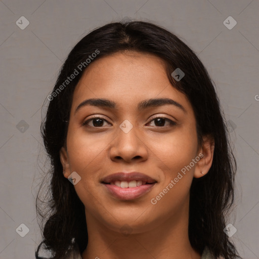 Joyful latino young-adult female with long  brown hair and brown eyes