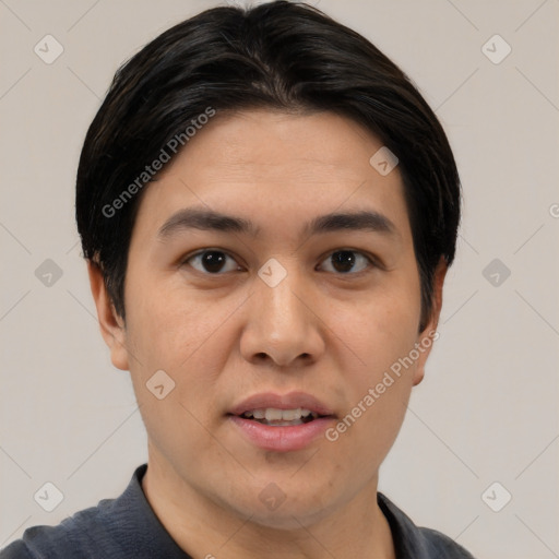 Joyful asian young-adult male with short  black hair and brown eyes