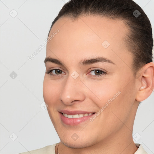 Joyful white young-adult female with short  brown hair and brown eyes