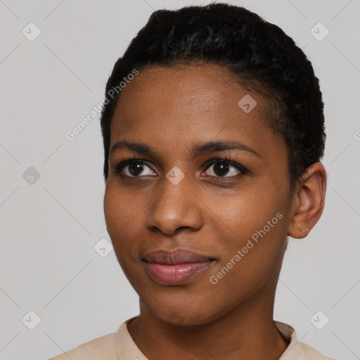 Joyful black young-adult female with short  black hair and brown eyes