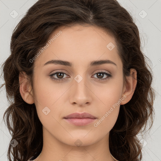 Neutral white young-adult female with long  brown hair and brown eyes