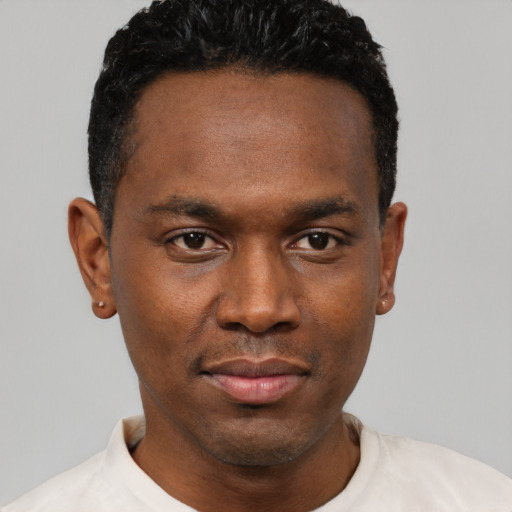 Neutral black young-adult male with short  black hair and brown eyes