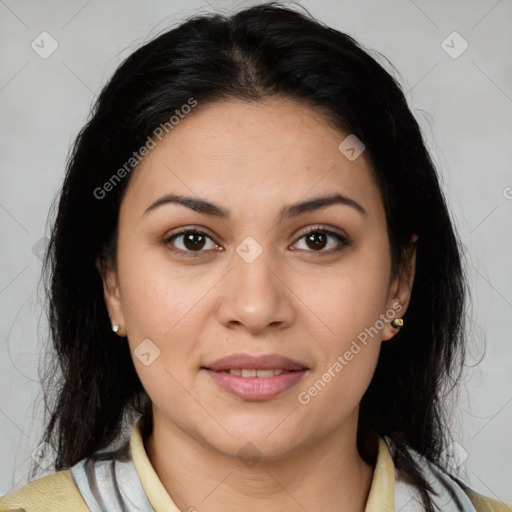 Joyful latino young-adult female with medium  brown hair and brown eyes
