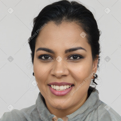 Joyful latino young-adult female with long  brown hair and brown eyes