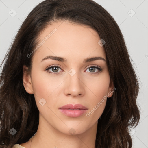 Neutral white young-adult female with long  brown hair and brown eyes