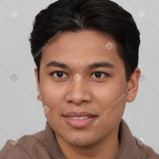 Joyful asian young-adult male with short  brown hair and brown eyes