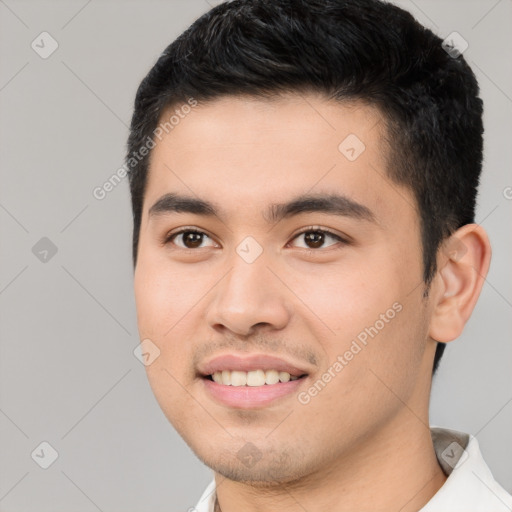 Joyful white young-adult male with short  black hair and brown eyes