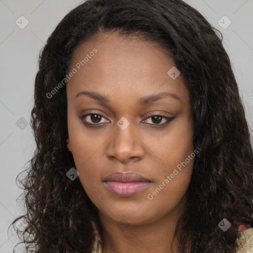 Joyful black young-adult female with long  brown hair and brown eyes