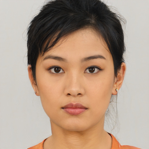 Neutral asian young-adult female with medium  black hair and brown eyes