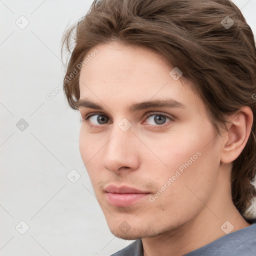 Neutral white young-adult male with short  brown hair and grey eyes