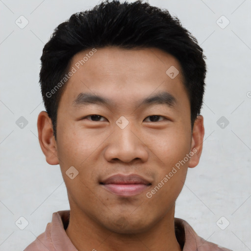 Joyful asian young-adult male with short  black hair and brown eyes