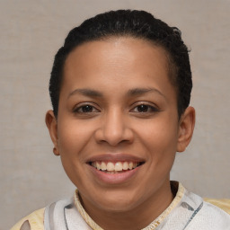 Joyful latino young-adult female with short  brown hair and brown eyes