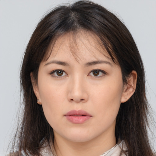 Neutral asian young-adult female with long  brown hair and brown eyes