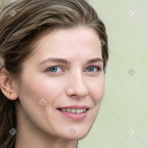 Joyful white young-adult female with long  brown hair and green eyes