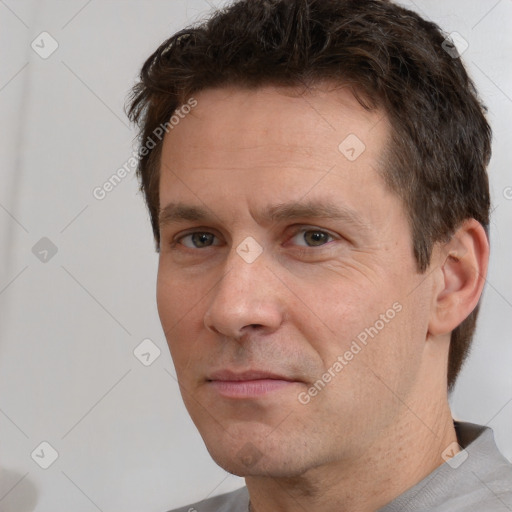 Neutral white adult male with short  brown hair and brown eyes