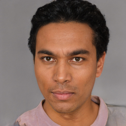 Neutral white young-adult male with short  black hair and brown eyes